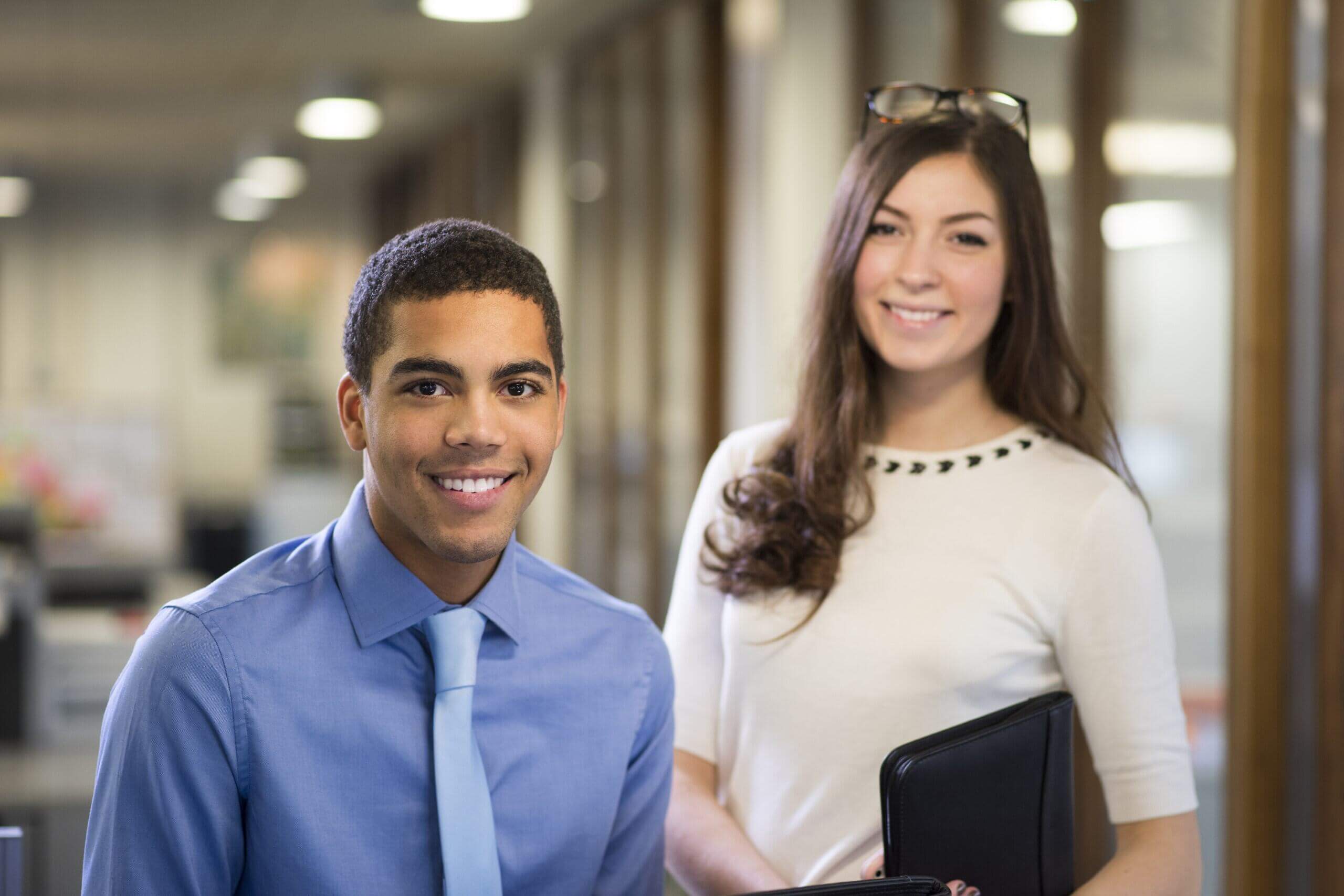 Students posing in office