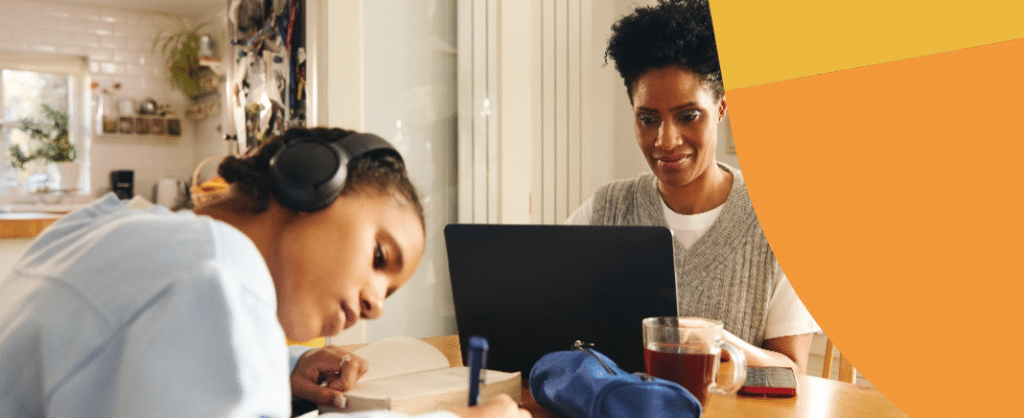 Students on a Computer and with Headphones